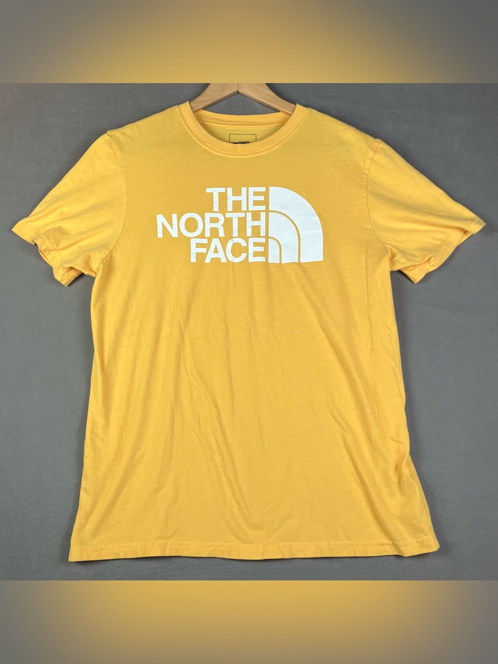 The North Face Men’s Size M Short Sleeve Graphic t Shirt Yellow White Logo. In g